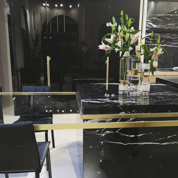 Sleek Black Cabinetry with Gold Hardware