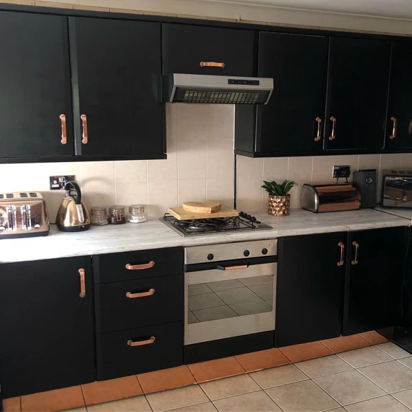 black and copper kitchen