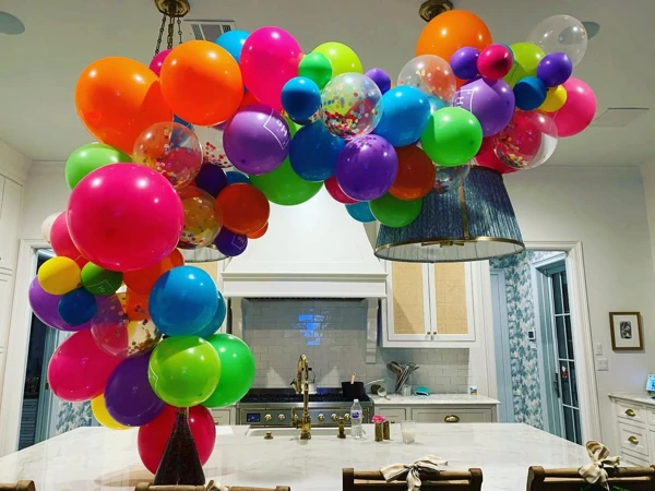 Rainbow Balloon Arch Over Island