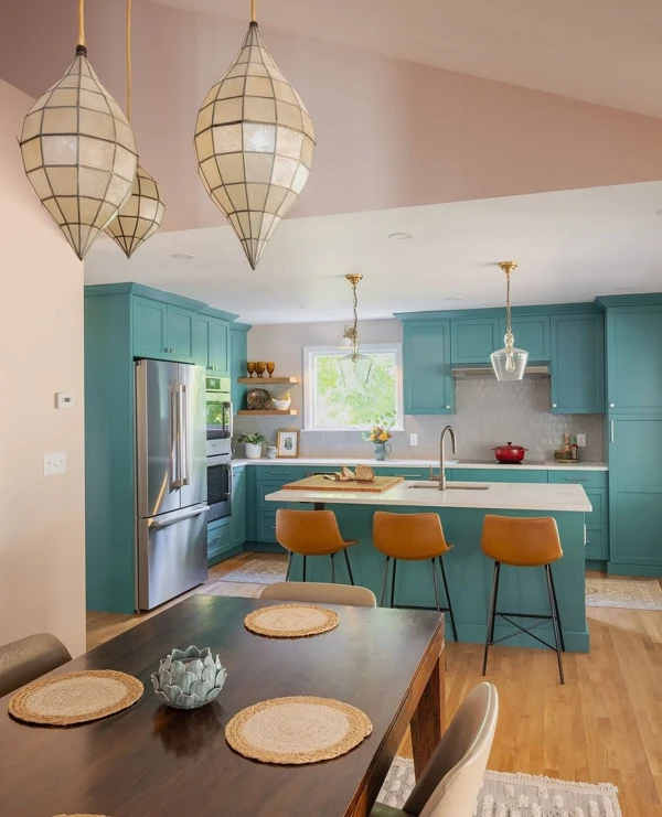 Turquoise Cabinets With Orange Accents