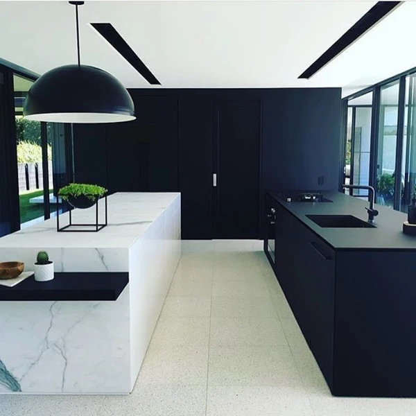 Monochrome Contrast With Sculptural Lighting