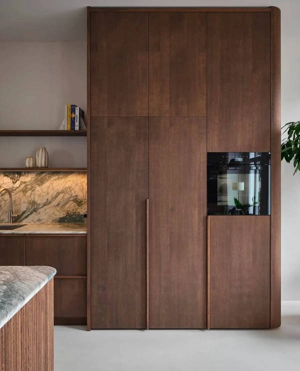 Seamless Walnut Wall Storage Design
