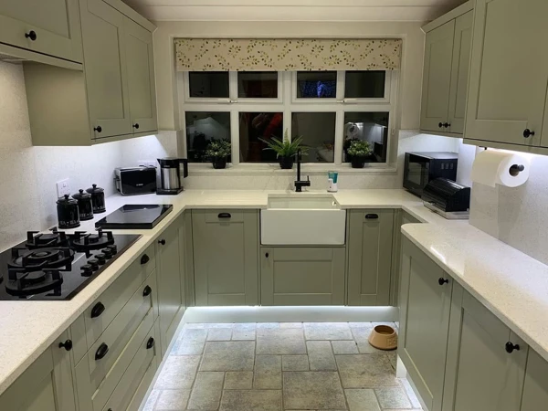 sage green and white kitchen