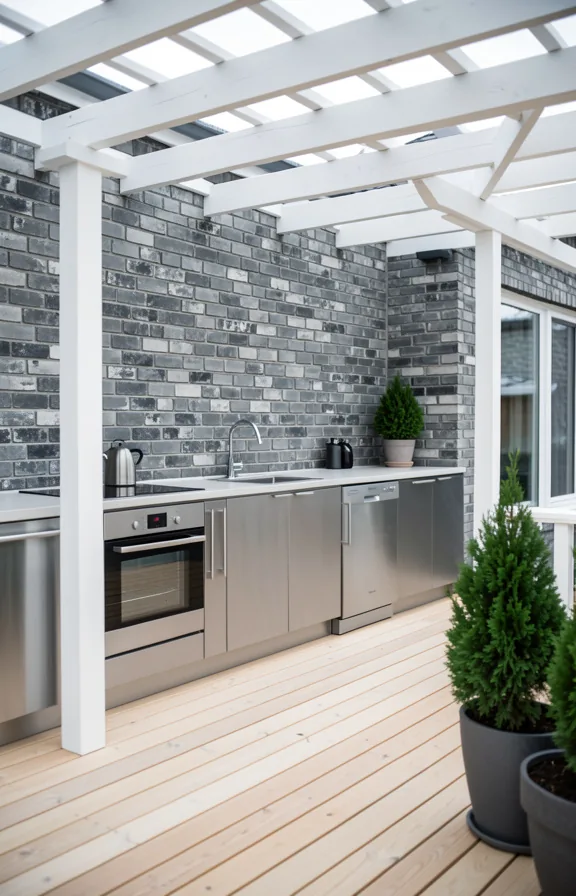 Scandinavian deck kitchen with weathered gray brick feature wall
