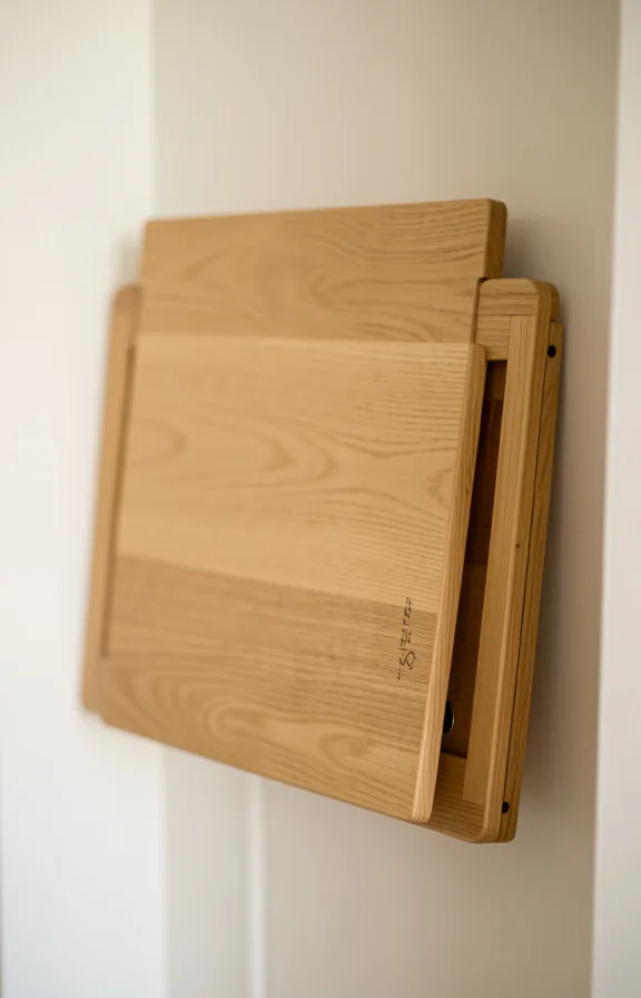 folded flat against pale walls when not in use