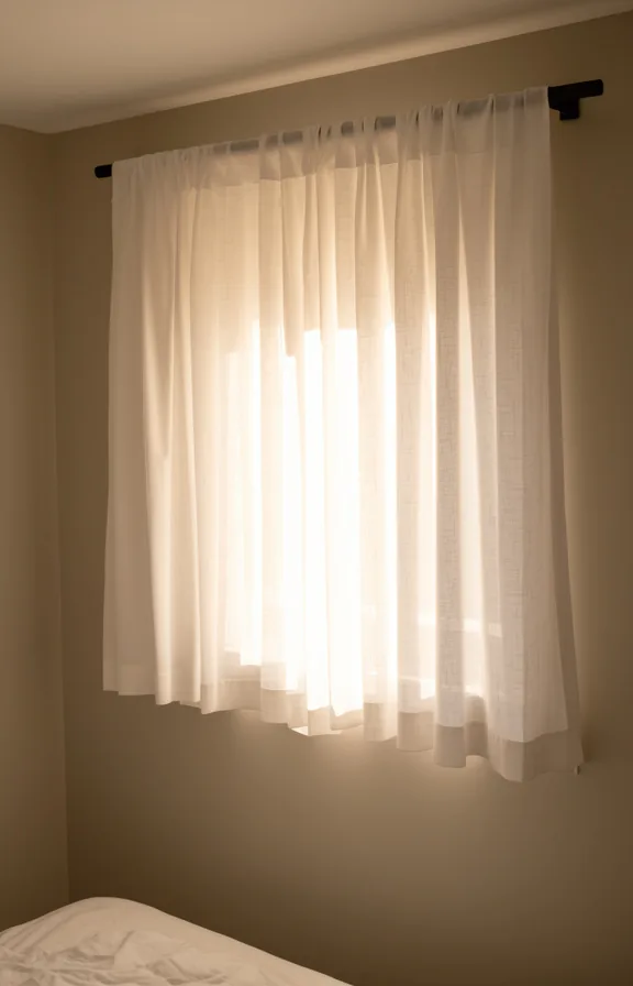 diffusing warm afternoon sunlight into a small dorm room